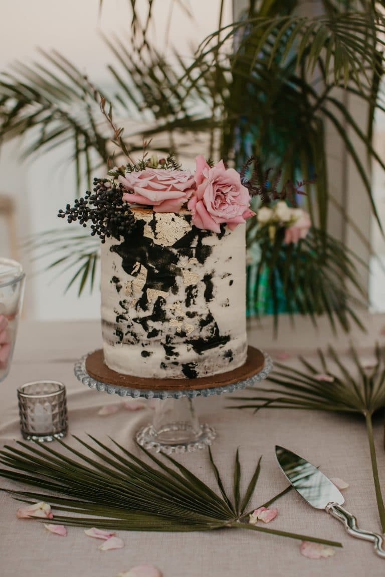 semi-naked-wedding-cake-on-glass-stand