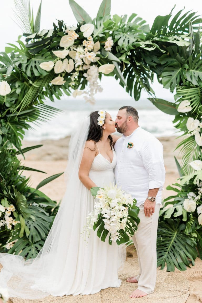 circular-wedding-arch-tropical-greenery-white-flowers
