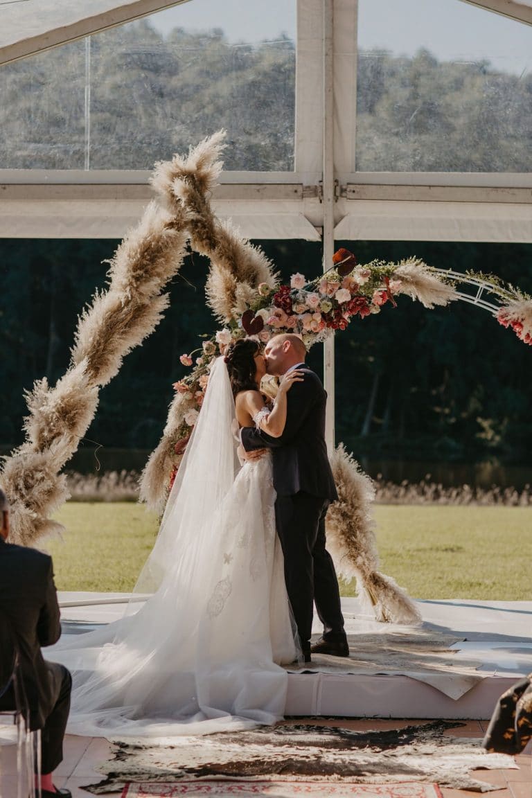 double-geometric-wedding-arch-with-florals-and-pampas-grass