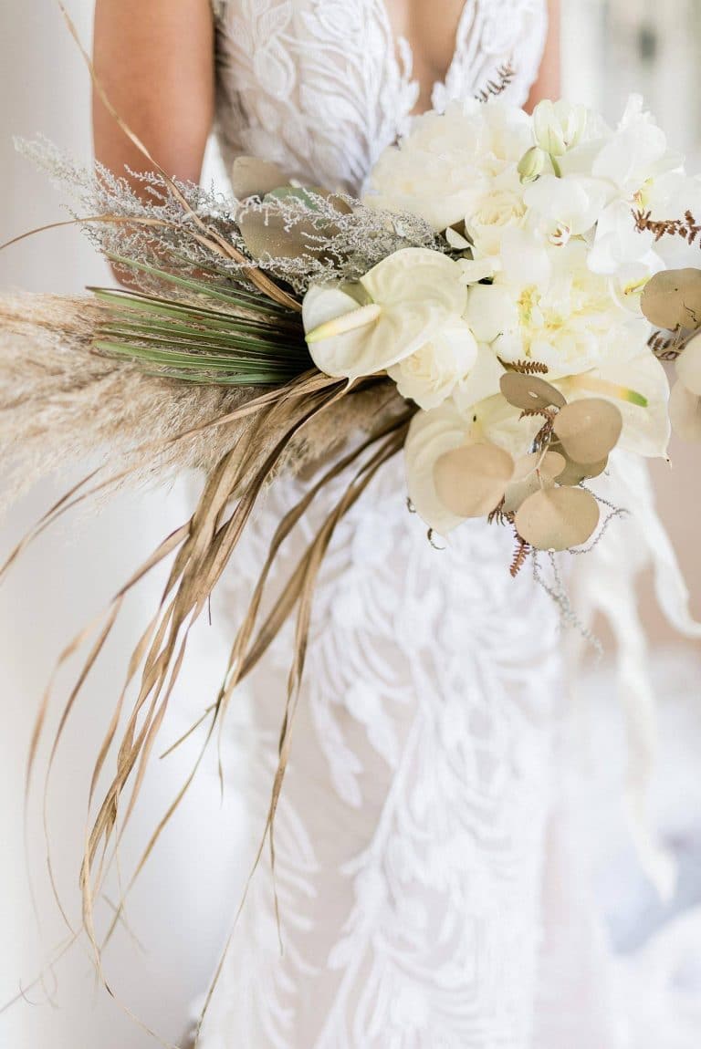 white anthurium peony and dried foliage bouquet