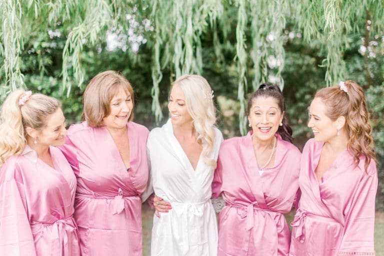 bridesmaids in pink robes