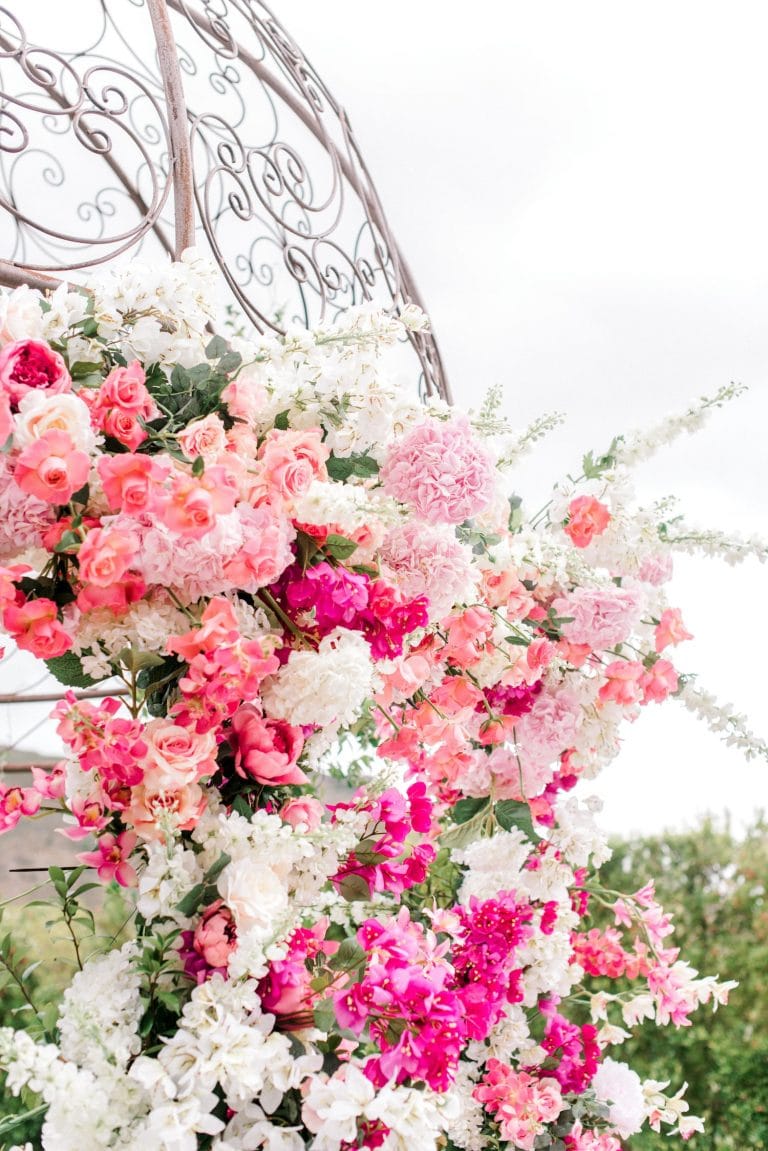 shades of pink floral arch
