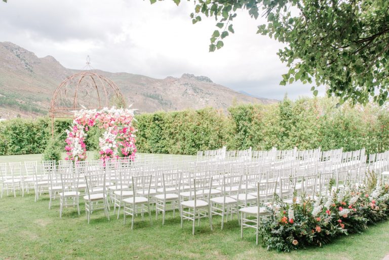 franschhoek outdoor wedding ceremony with floral arch