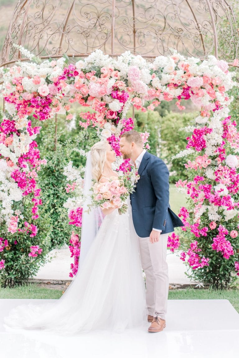 la paris wedding with pink floral arch