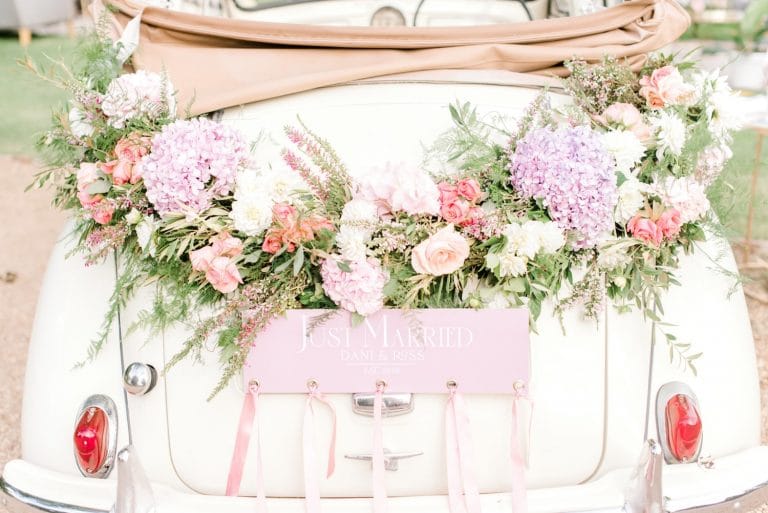 morris minor getaway car with flower decorations