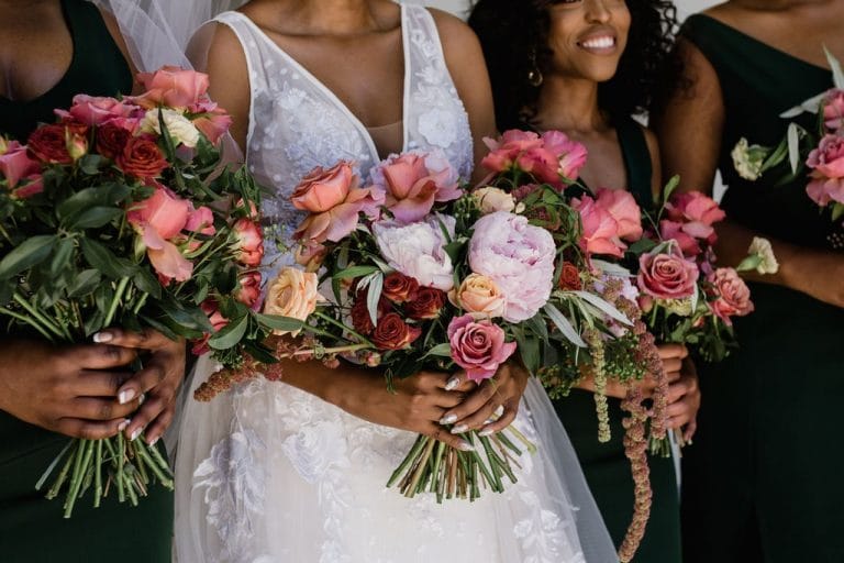 pink coral red rose bouquets
