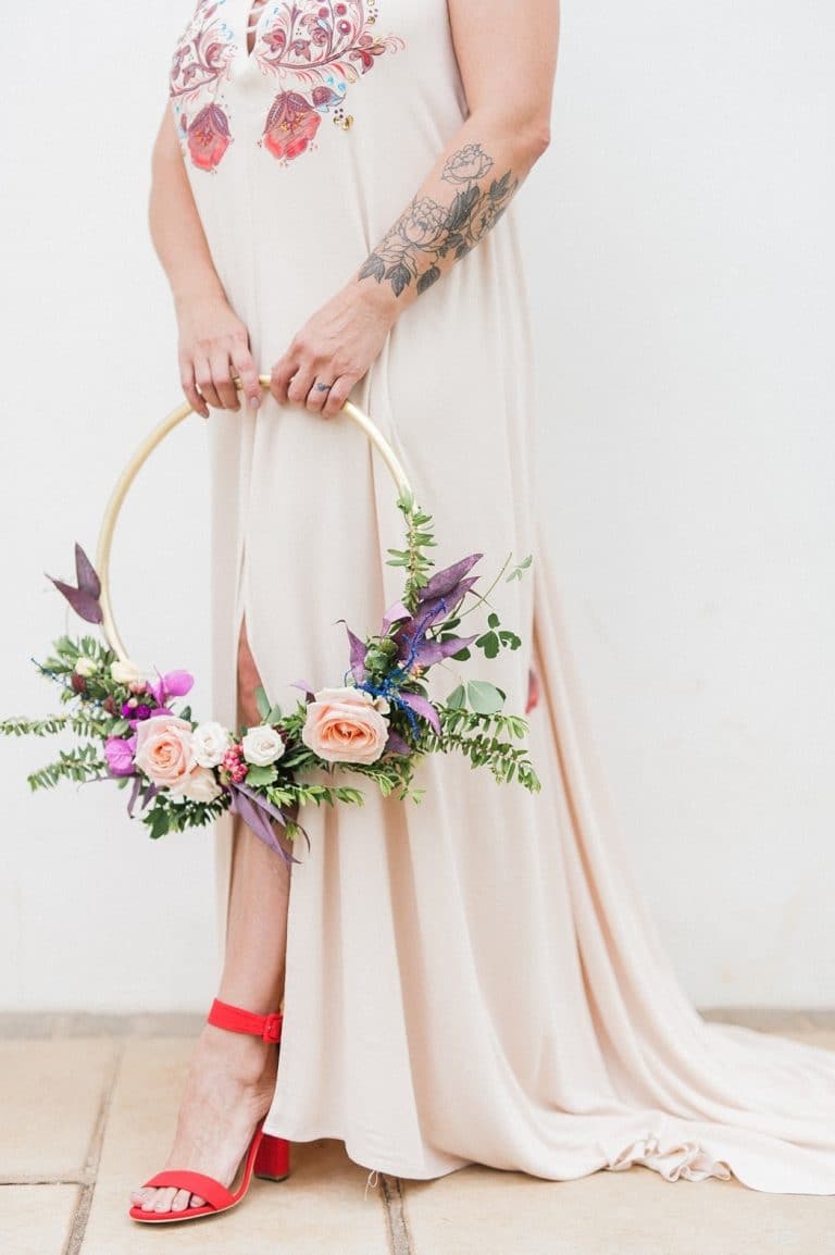 bride with hoop bouquet