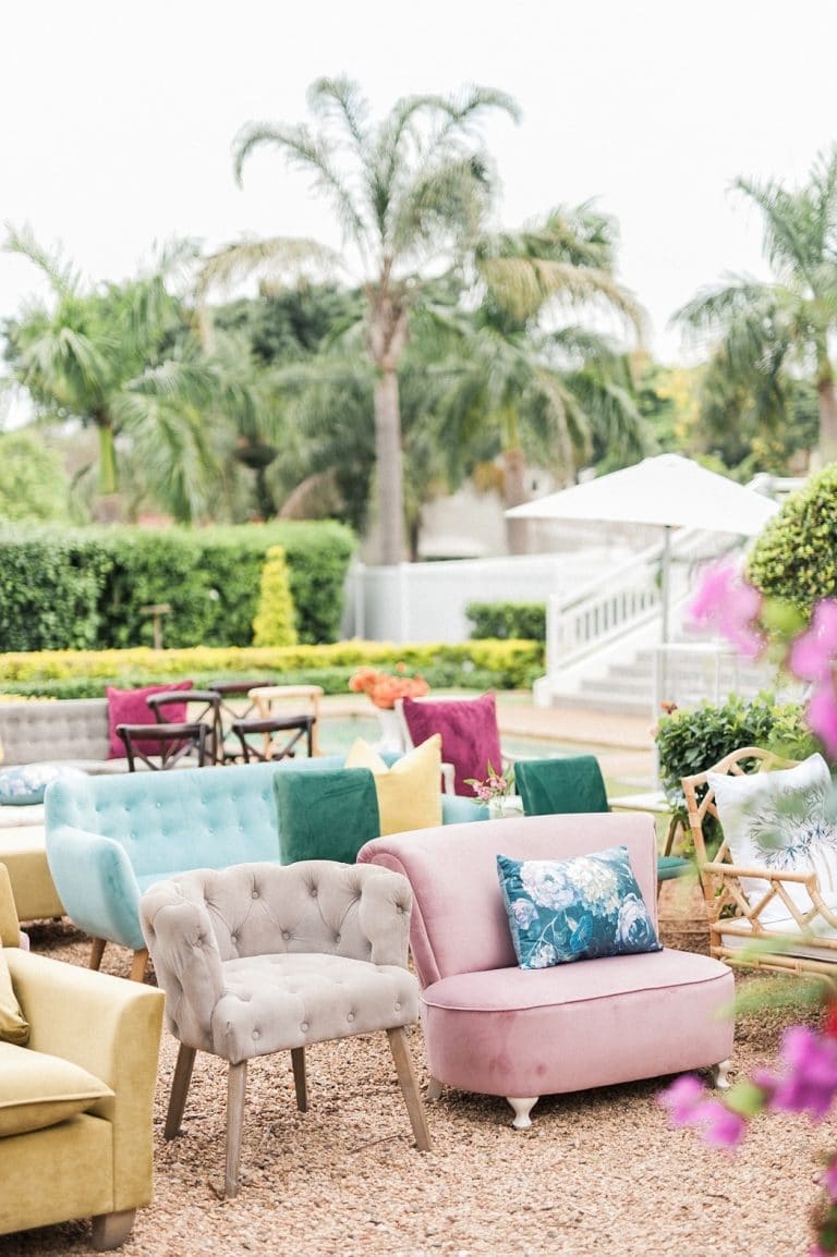 mismatched colourful seating for at-home wedding