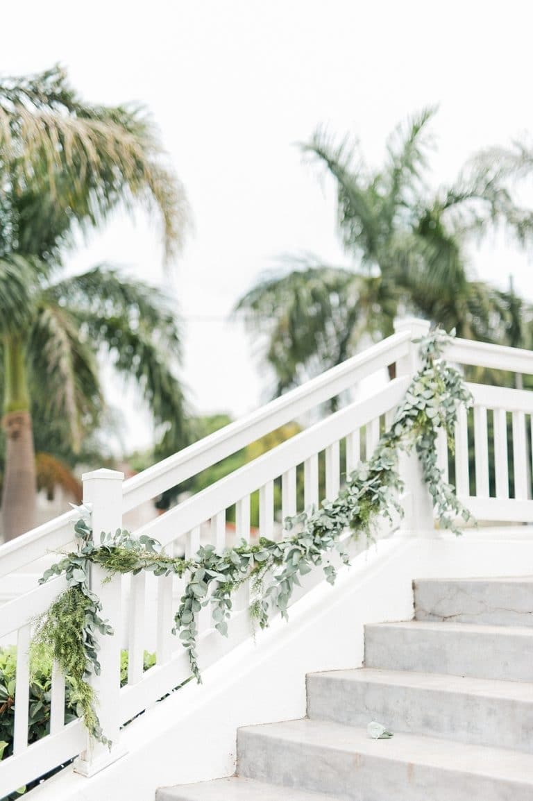 at-home wedding staircase greenery