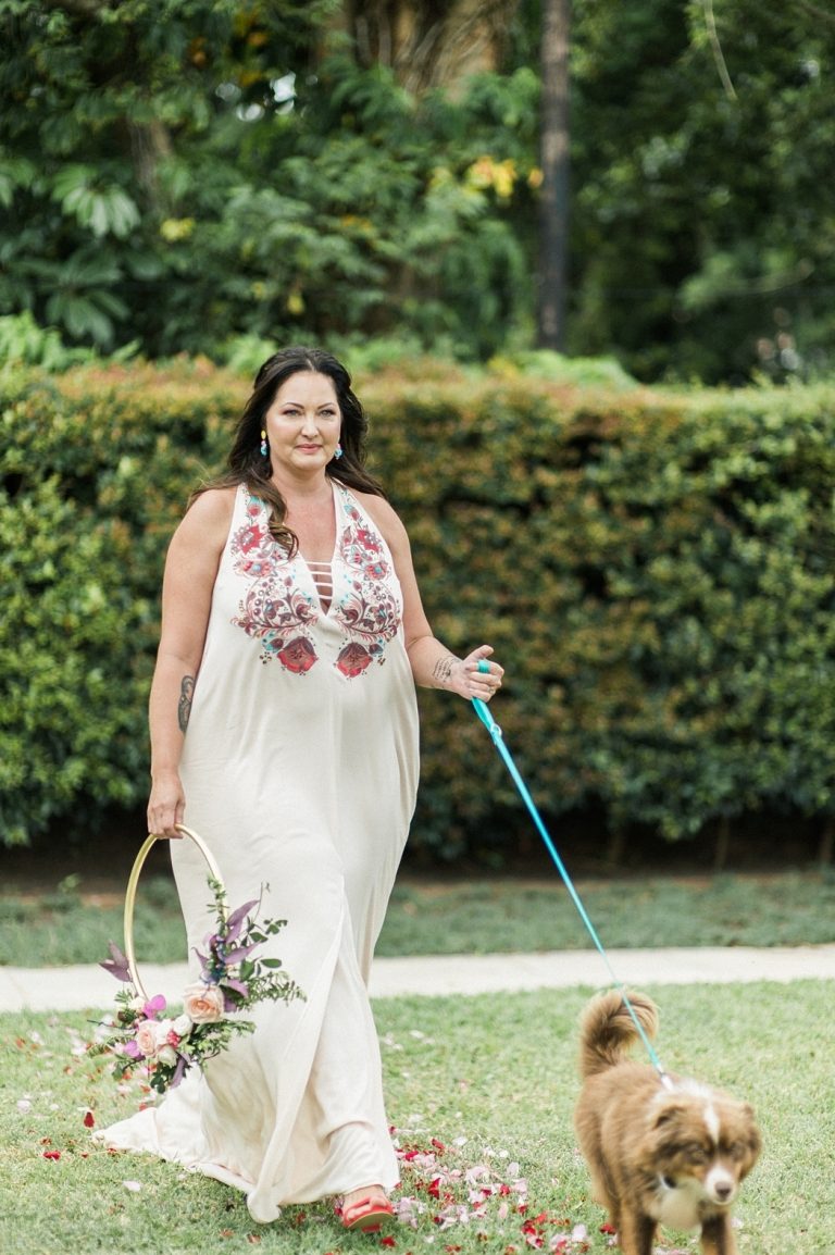 bride with dog attendant