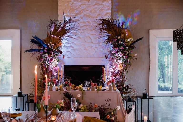 fireplace floral installation with neon lights