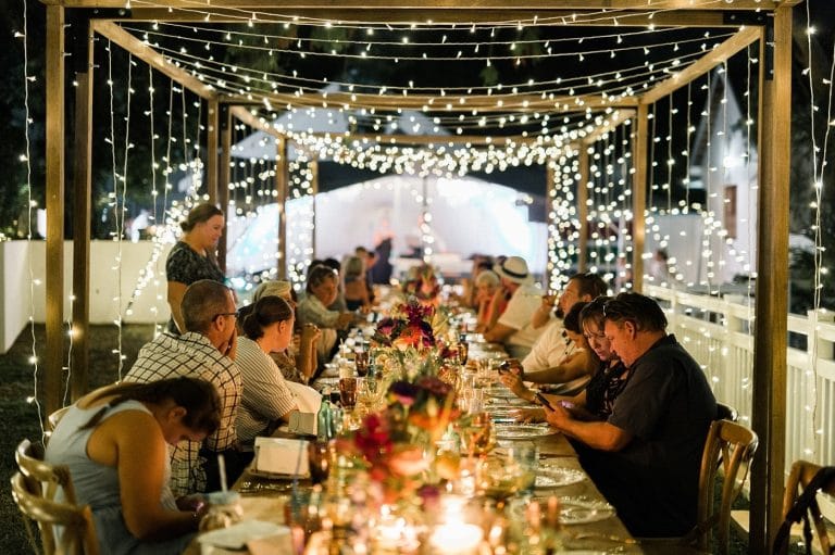 at-home wedding tables with fairy lights