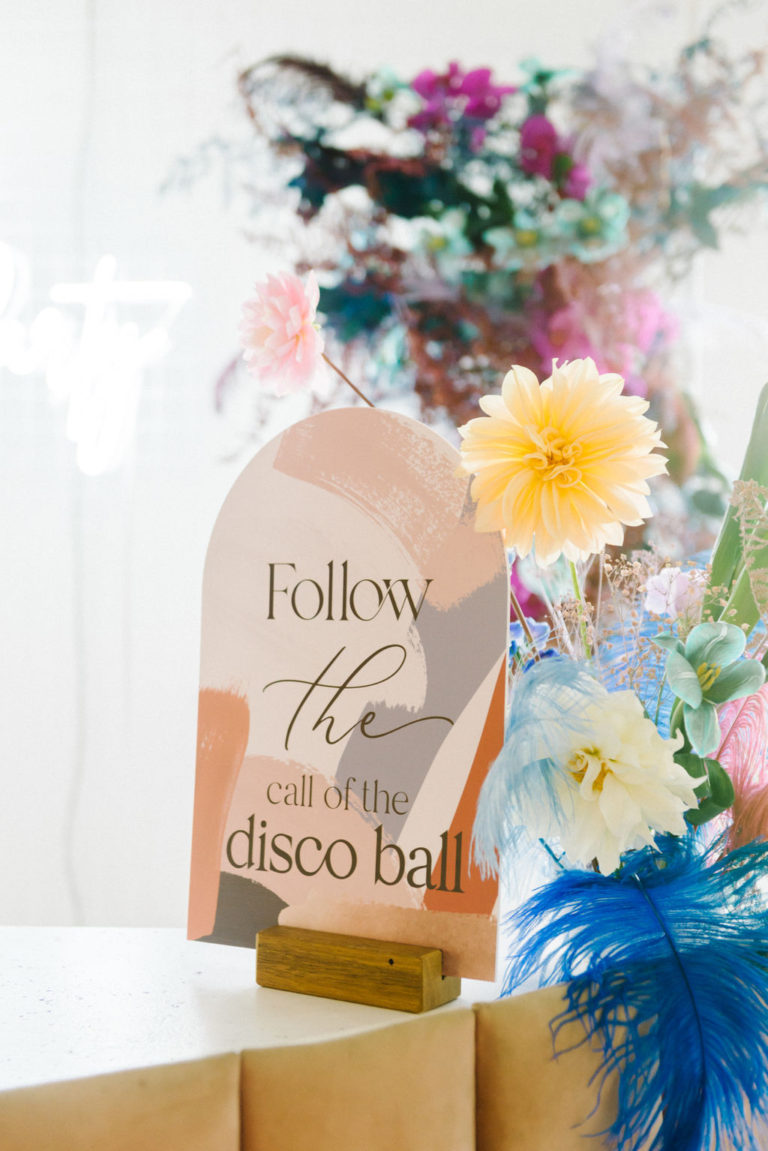 follow the disco ball wedding signage